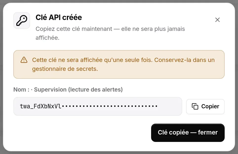 Fenêtre Clé API créée : avertissement, clé masquée pour cette capture, bouton Copier