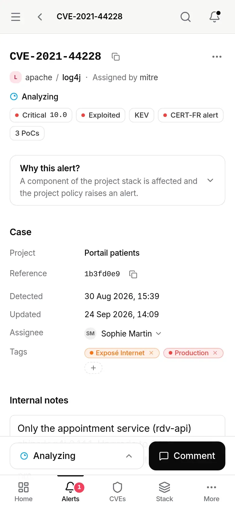 Alert record on a phone, full-width tracking bar: Analyzing, Comment